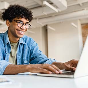 man working at laptop